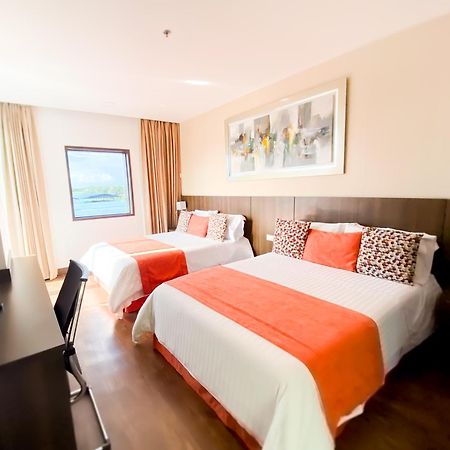 Hotel Royal Elim International Cali Bagian luar foto A room at the hotel