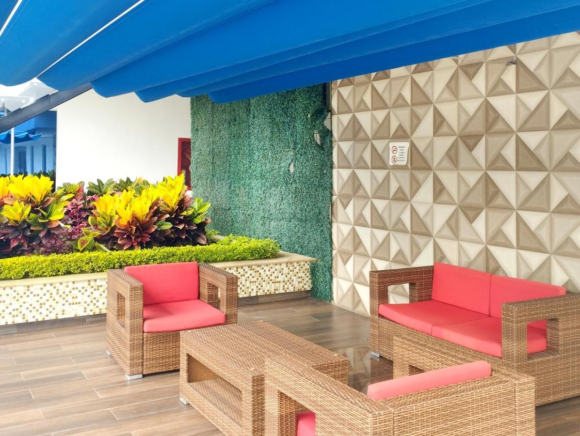 Hotel Royal Elim International Cali Bagian luar foto The Sky Lounge