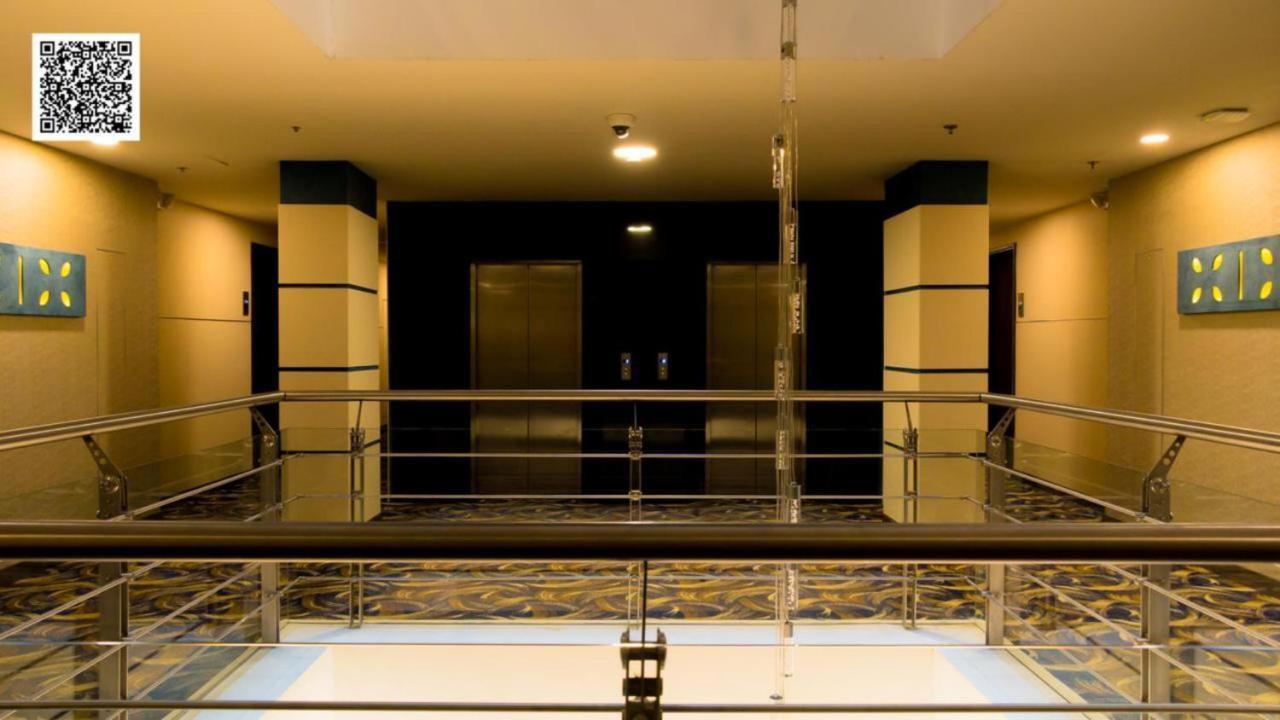 Hotel Royal Elim International Cali Bagian luar foto The interior of the hotel