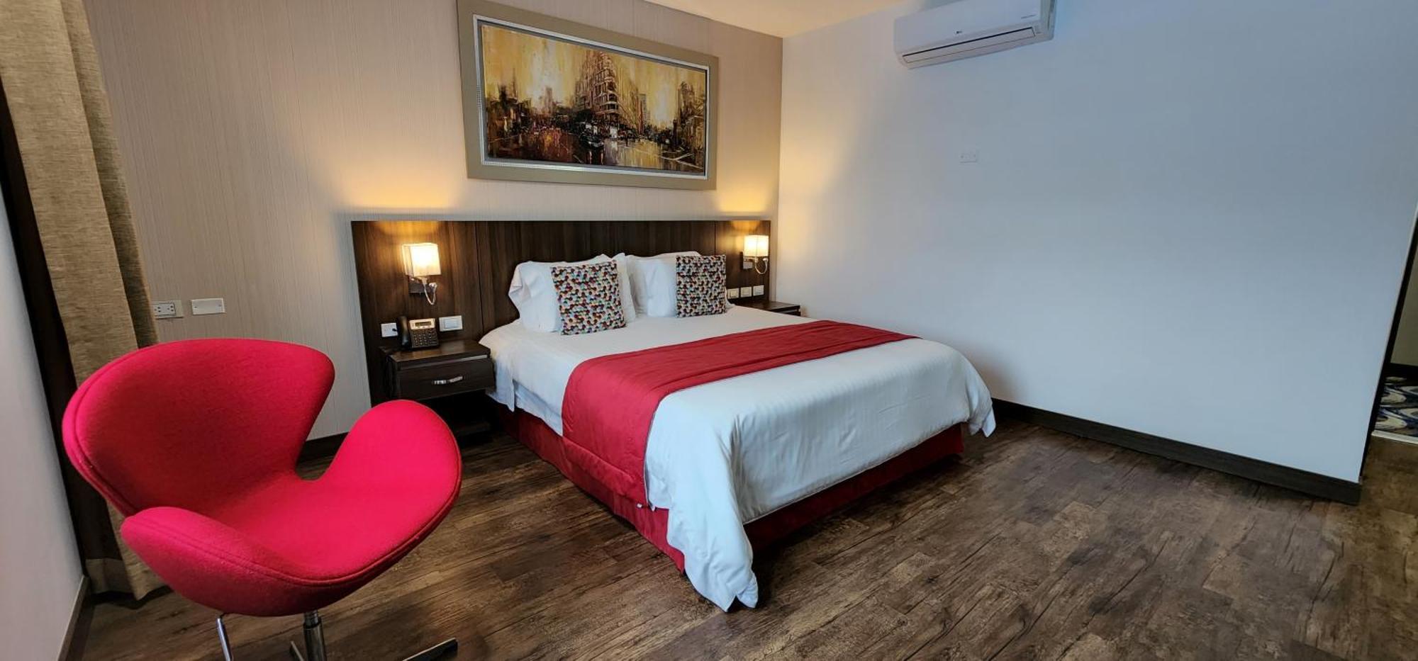 Hotel Royal Elim International Cali Bagian luar foto A room at the hotel