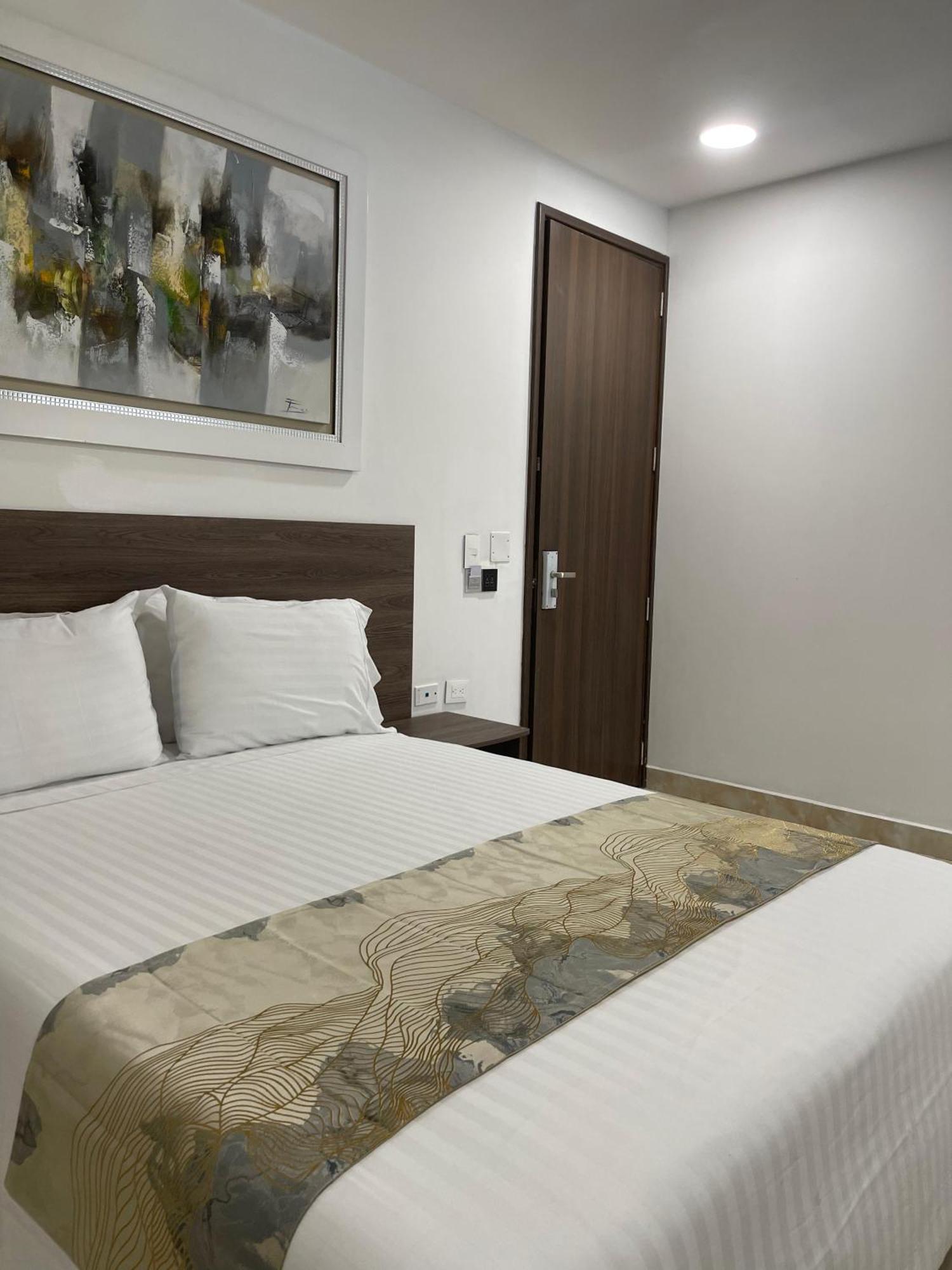 Hotel Royal Elim International Cali Bagian luar foto A room at the hotel